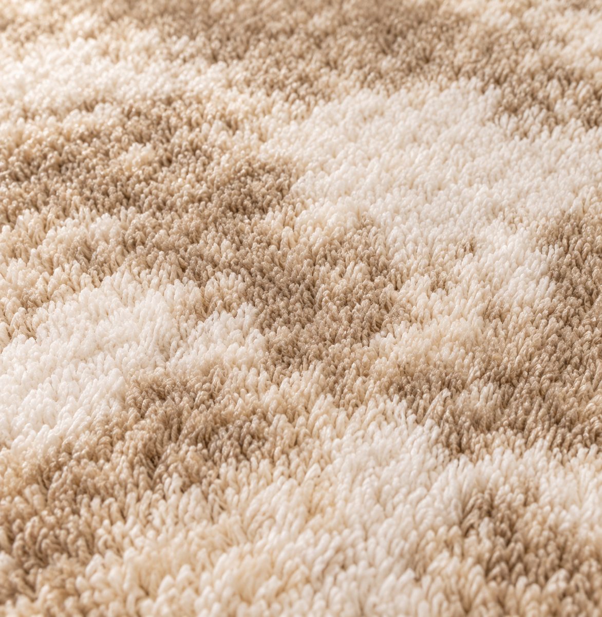 Zoom motif Tapis rond Unkai marbré Maillard